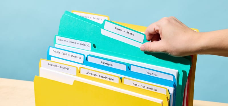 Stack of past exam Paper 1 documents